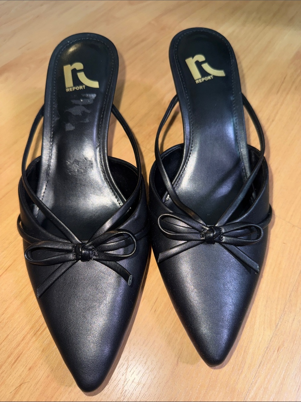 Report Black Pointed Toe Slingback Mules with Bow Accent